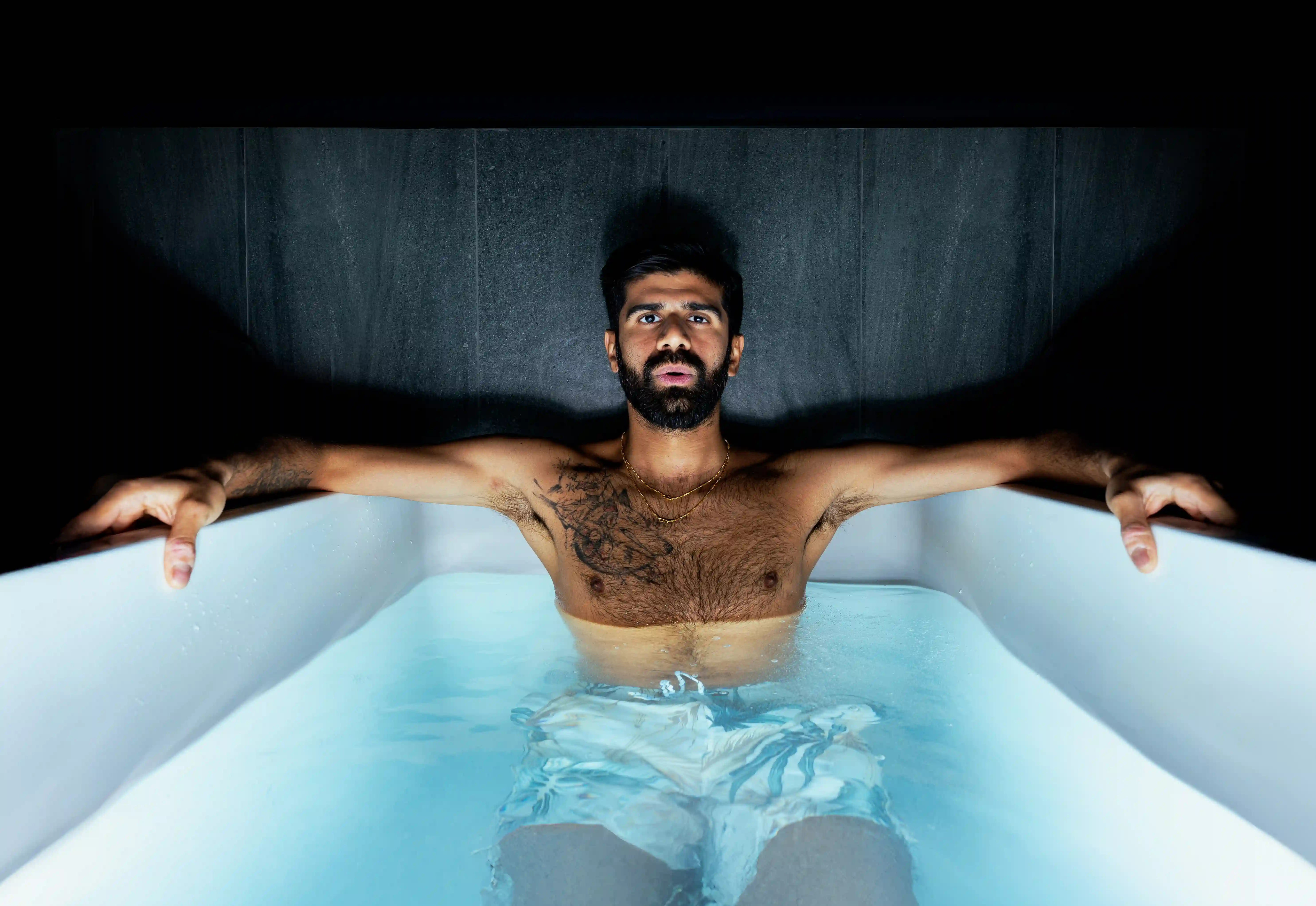 Cold plunge therapy session at Revibe Wellness