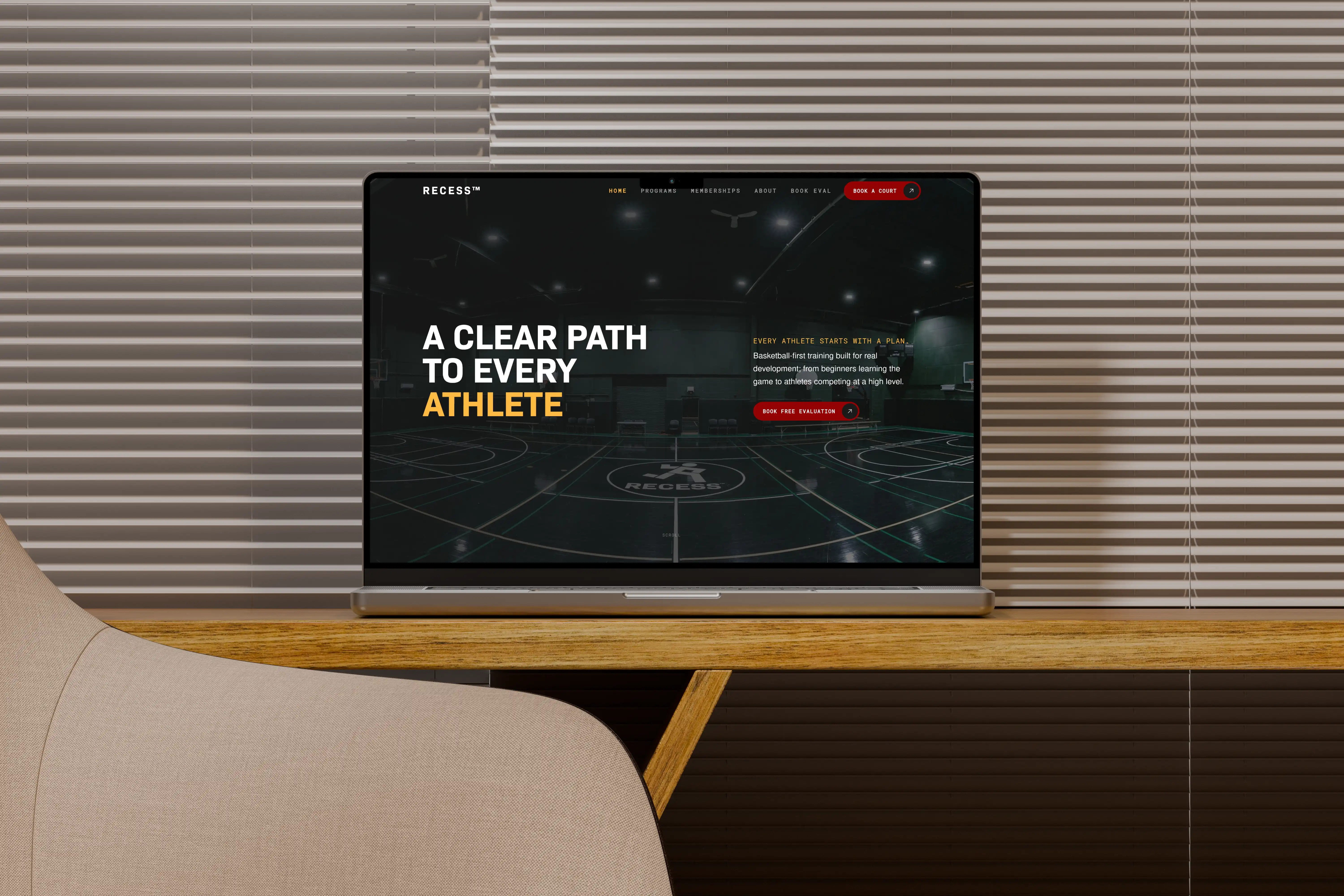 Recess Athletics Club website shown on a laptop